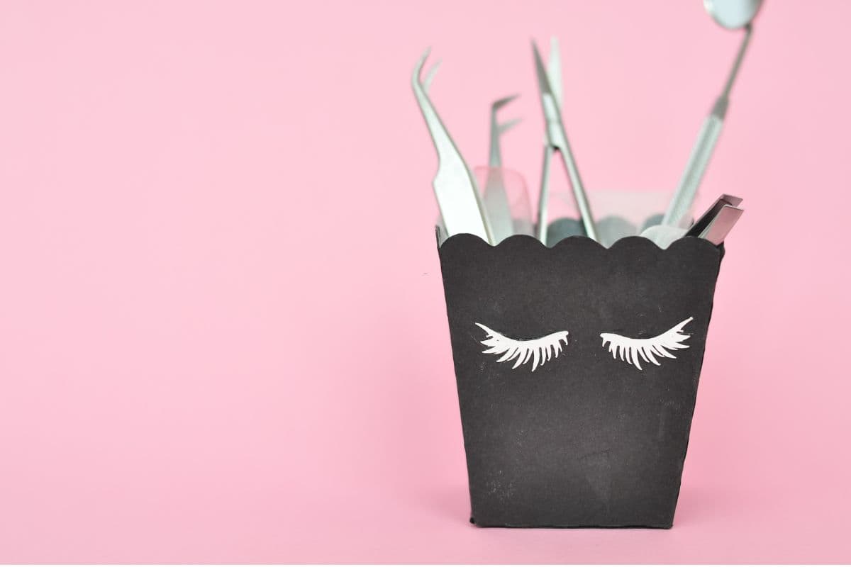 Eyelash extension equipment laid out for a California booth rental lash tech