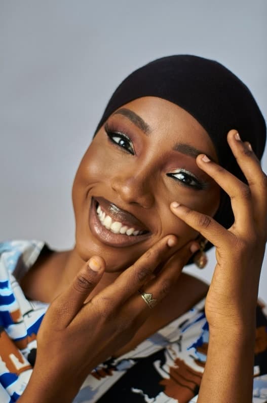 Happy lash client satisfied with professional lash extension service and proper licensing compliance